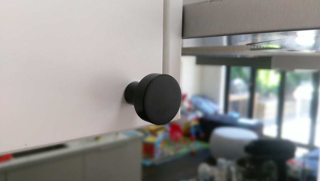 black cupboard knob door