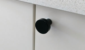 black cupboard knob situational
